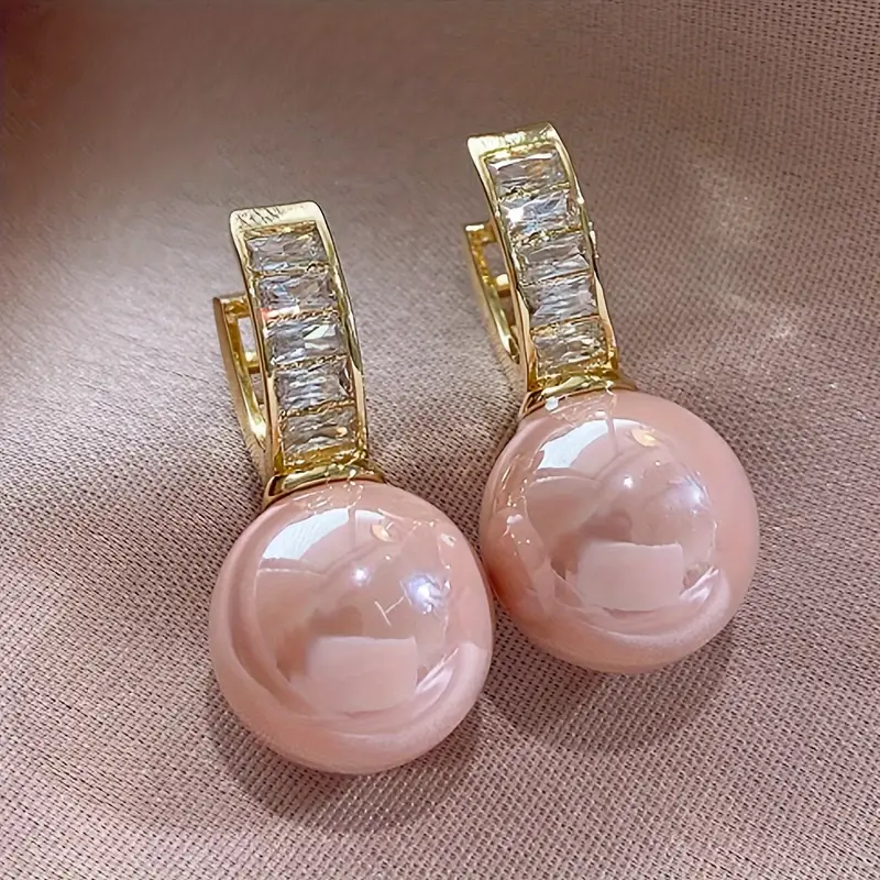 Orecchini in oro con zirconio rosa