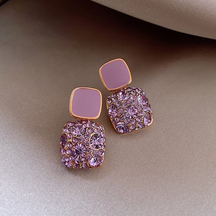 Orecchini di lusso viola con incrustazione di zirconio