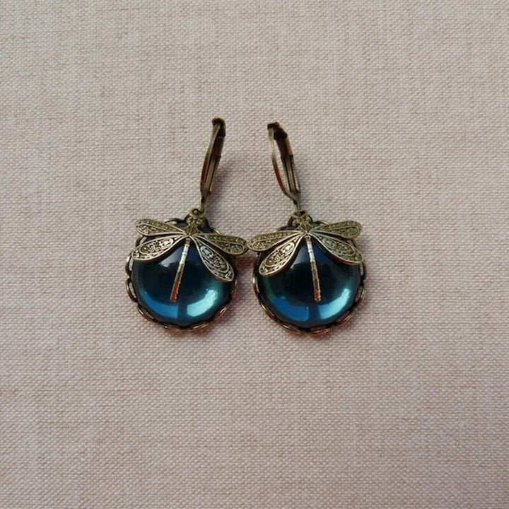 Orecchini in cristallo blu con cristallo blu in oro antico